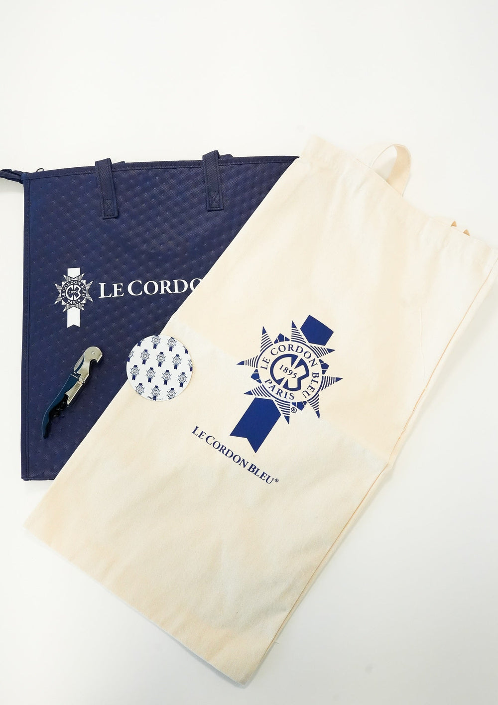 Coffret cadeau pique-nique - Sac isotherme bleu, tire-bouchon, sac à pain et Dropstop